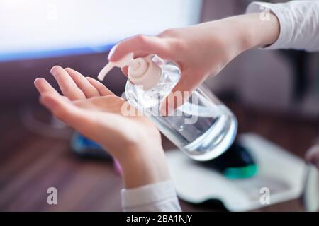 The child disinfects their hands with a disinfectant. New Epidemic Coronavirus 2019 nCoV. Selective focus. Stock Photo