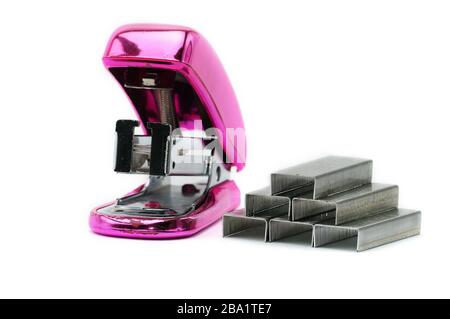 Pink office stapler on an isolated white background Stock Photo