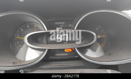 renault clio 1.5 dci diesel dashboard indicates digital numbers driving speed, rpm, and fuel average distance Stock Photo - Alamy