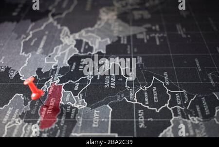 Turkey map highlighted against dark world map background. Concept representing the Chinese Wuhan's virus Covid-19 or Coronavirus in Turkey. Stock Photo