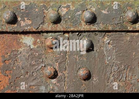 Rivets on an old disuused railway bridge Stock Photo