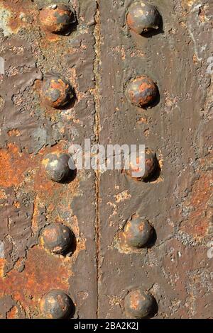 Rivets on an old disuused railway bridge Stock Photo