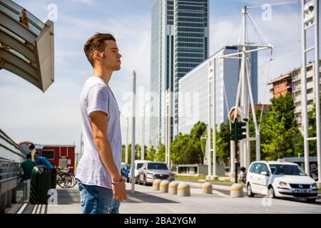 Attractive young man in city Stock Photo
