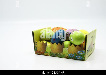 Cardboard basket of wooden easter eggs Stock Photo