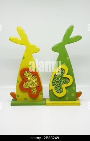 Wooden rabbits. Colorful figures Stock Photo