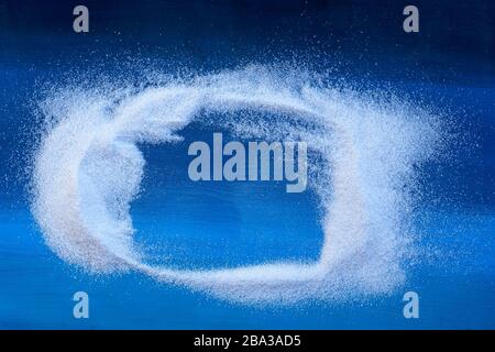 White sand frame on blue background Stock Photo