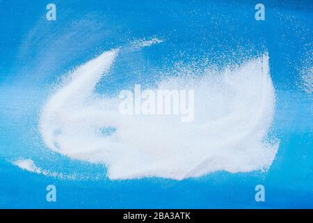White sand on blue background Stock Photo