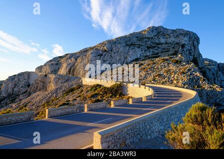 Mountain road at Cap Formentor in the morning light, near Pollenca, Majorca, Balearic Islands, Spain Stock Photo