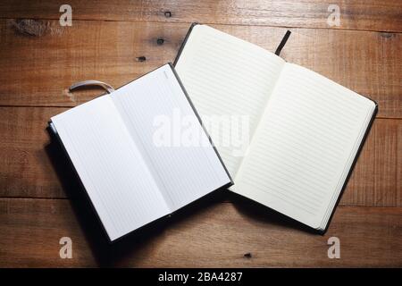 Notebooks on Wooden Background Stock Photo