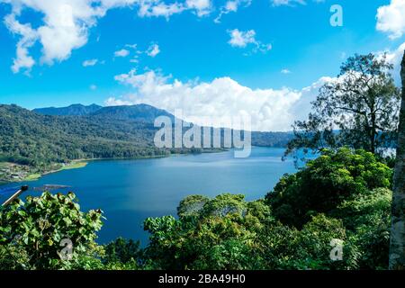 Azure beach with rocky mountains and clear water of Indian ocean at sunny day, A view of a cliff in Bali Indonesia Stock Photo