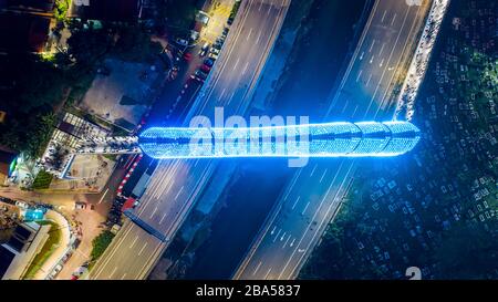 Kuala Lumpur, Malaysia - February 22, 2020 : Aerial drone view of newly opened pedestrian bridge Saloma Link connecting Kampung Baru with Ampang road. Stock Photo