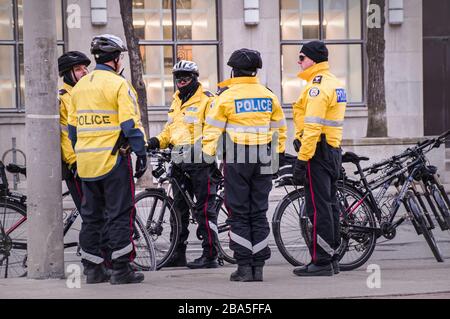 TORONTO, CANADA - 01 04 2020: Toronto Police bicycle patrol officers guarding the University avenue in Downtown Toronto Stock Photo