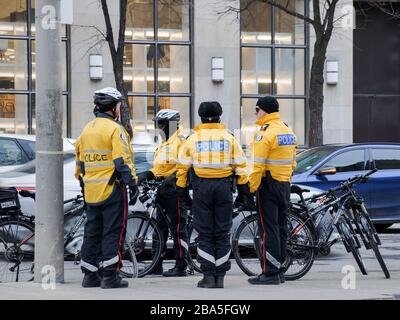 TORONTO, CANADA - 01 04 2020: Toronto Police bicycle patrol officers guarding the University avenue in Downtown Toronto Stock Photo