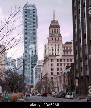 TORONTO, CANADA - 01 04 2020: Autumn view along University ave with Canada life building. The Canada Life Building is a 87 m high fifteen-floor Stock Photo