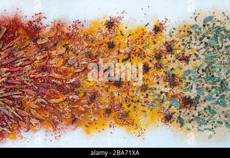 Spice explosion. Aromatic spices on a white background Stock Photo
