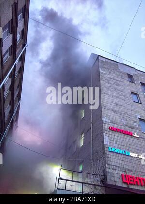 Saint Petersburg, Russia-02 February 2020: the building of the Lenizdat business center market Apraksin Dvor is on fire. Stock Photo