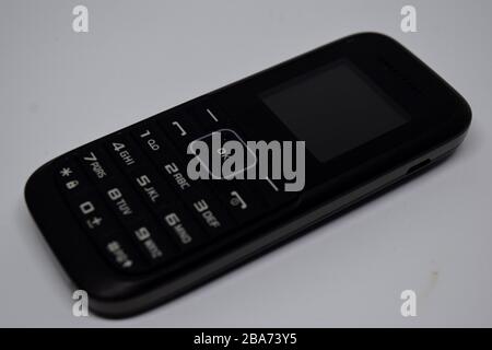 Close up old handphone isolated on White Background. Stock Photo