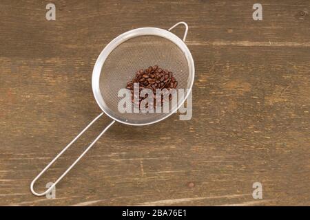 Watermelon seeds on wooden background, ready for sowing Stock Photo