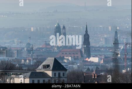 Dresden, Germany. 26th Mar, 2020. View in the morning over the city centre with the town hall (l-r), the Frauenkirche, the Dreikönigskirche and the Kreuzkirche Credit: Robert Michael/dpa-Zentralbild/dpa/Alamy Live News Stock Photo