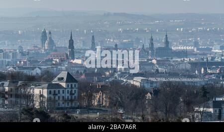 Dresden, Germany. 26th Mar, 2020. View in the morning over the city centre with the town hall (l-r), the Frauenkirche, the Dreikönigskirche, the Kreuzkirche, the Hofkirche and the Hausmannsturm Credit: Robert Michael/dpa-Zentralbild/dpa/Alamy Live News Stock Photo