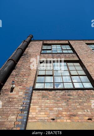 Warehouse building facade from below Stock Photo