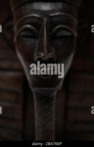 Statuette, bust of a pharaoh, carved on stone. Souvenir from Egypt. Stock Photo