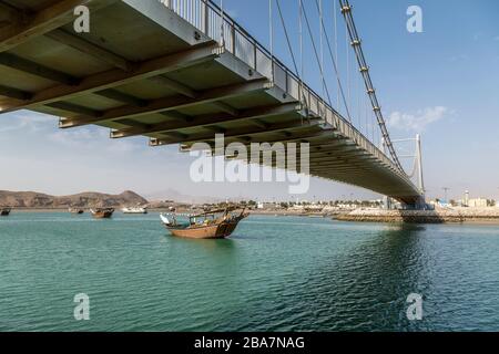 The city of Sur, Oman. Showing traditional boats moored up in the coastal waters of the Gulf Of Oman. Stock Photo