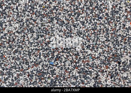 Coloured Stone Plaster Background: White-Blue-Red Variegated Stone Plaster Detail Stock Photo