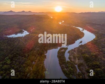 A sunrise over the Mazowe river seen from a drone. Stock Photo