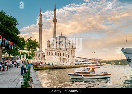 Istanbul Turkey June 2018, Ortakoy neighbourhood of Istanbul located by the Bosphorus coastline on the European side , Ortakoy mosque in istanbul Stock Photo