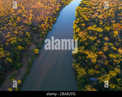 A sunrise over the Mazowe river seen from a drone. Stock Photo