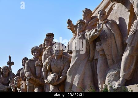 Beijing, China - October 2019; Low angel view of section of the revolutionary monument in front of Mausoleum of Mao Zedong at Tiananmen Square against Stock Photo