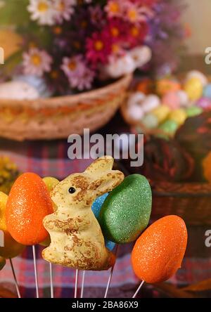 Rabbit Toy and Colorful Paschal Easter Eggs Stock Photo