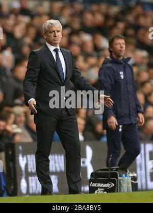 Queens Park Rangers manager Mark Hughes (left) on the touchline Stock Photo