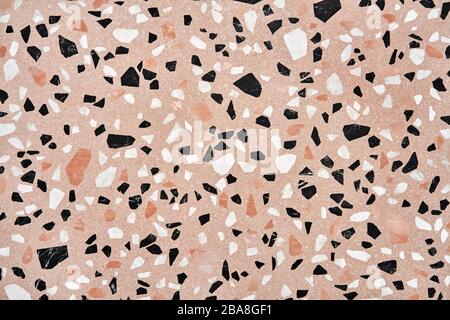 Closeup view at stone wall with geometric patterns Stock Photo