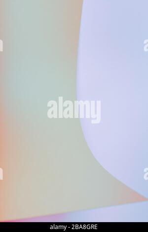 Pink and blue abstract paper background from a curved sheet. Blank for website, advertising, presentation. Stock Photo
