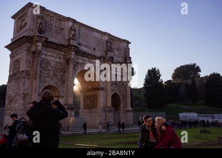 Tourists at the Arch of Constantine in Rome Stock Photo