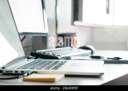 Work desk with computers, working from home Stock Photo