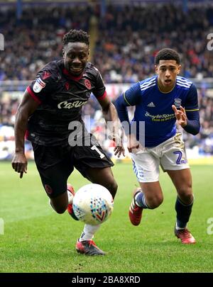 Reading's Andy Yiadom battle for the ball with Birmingham City's Jude Bellingham during Birmingham City's and Reading's Stock Photo