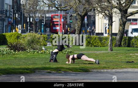 Brighton UK 26th March 2020 - Exercise time in Brighton on day three of governments lockdown restrictions during the Coronavirus COVID-19 pandemic crisis . Credit: Simon Dack / Alamy Live News Stock Photo