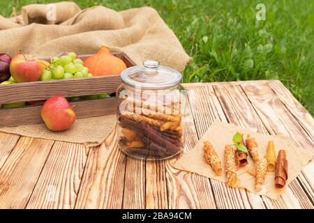 Sweet pureed fruit pastille. Natural sweets from dried berries and fruits. Stock Photo
