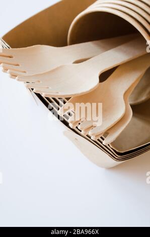 Eco-friendly biodegradable cardboard or paper dishes on white background. Zero waste recycling concept. Catering and street fast food paper cups, plat Stock Photo