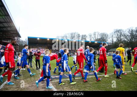 FC Halifax Town and Ebbsfleet players enter the pitch during the  Vanarama Conference Premier League  match at The Shay Stock Photo