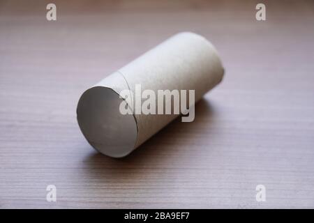 empty toilet roll - no toilet paper left - panic buying creates shortage in times of corona crisis Stock Photo