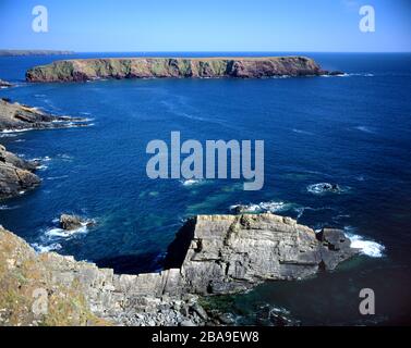 Gateholm Island and rocky shoreline, Marloes, Pembrokeshire, West Wales. Stock Photo