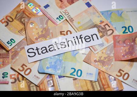 Covid-19 symbol in  Marktoberdorf, Germany, March 26, 2020. Due to the Corona virus disease (COVID-19) , worldwide governments have to spend a lot of money for emergency programs. on March 26, 2020 in Marktoberdorf, Germany  © Peter Schatz / Alamy Live News Stock Photo