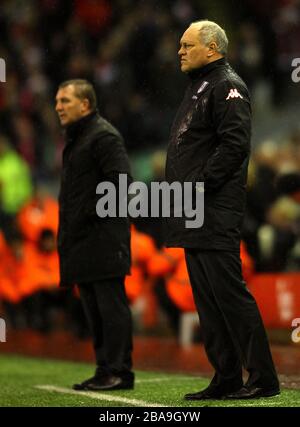 Fulham manager Martin Jol (right) and Liverpool manager Brendan Rodgers on the touchline Stock Photo