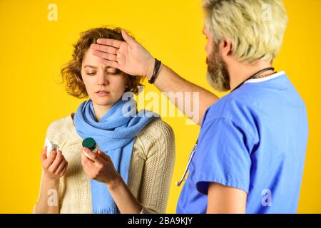 Medical check up. Doctor and patient at hospital. Instruction taking medicines. Doctor prescribing treatment. Consultation concept. Pneumonia treatment. Effective medicines. Girl viral disease. Stock Photo