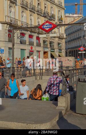 Puerta del sol,Madrid,Spain;September 16 2018: Image of the subway station of Sol with people coming and going and background old buildings in Puerta Stock Photo