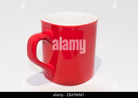 Empty red and white coffee cup on a white background Stock Photo